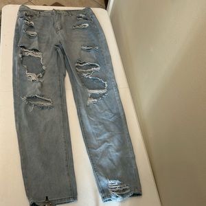 Light wash ripped jeans size Large worn 5-6 times in good condition
